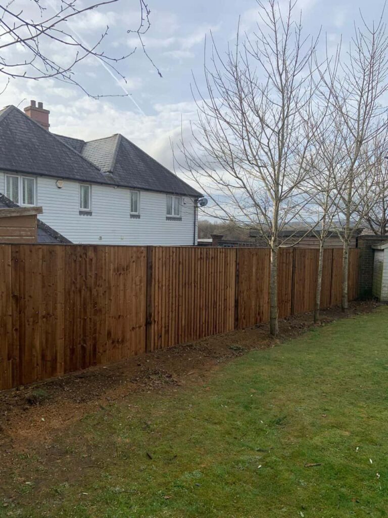 This is a photo of feather edge fencing installed in a residential properties garden by Fast Fix Fencing Toftwood